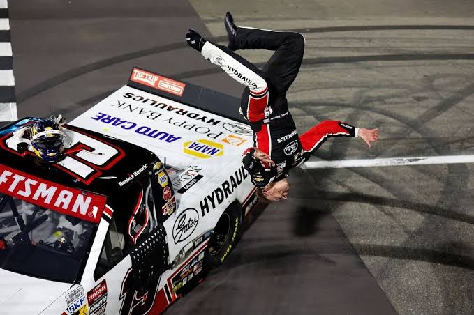 DANIEL HEMRIC CELEBRATES IN HIS FIRST NASCAR TRUCK VICTORY WITH A BACKFLIP.